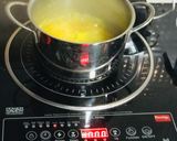 A picture of step 2 of Narkel diye Bhaja Muger Dal: Bengali Style- Yellow Moong Dal with Coconut (Without Onion-Garlic).