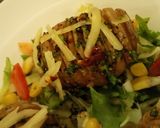 A picture of step 4 of Hasselback Potatoes Served with garden fresh salad.