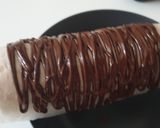 Foto del passaggio 2 della ricetta Cestini di cioccolato extra fondente con panna e frutta
