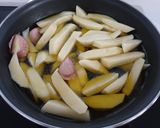 Foto del paso 2 de la receta Huevos rotos con jamón