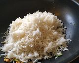 A picture of step 10 of Lemon Rice With Masala curd.