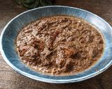 A picture of step 9 of Khasi Smokey Black Sesame Chicken Curry.