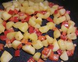 A picture of step 2 of Pan fried swordfish with peppers and potatoes.