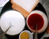 A picture of step 7 of Delicious tower sandwich.