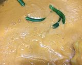 A picture of step 7 of Alu matar gravy.