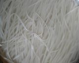 A picture of step 1 of Shrimp Rice Noodles with stir fried vegetables.