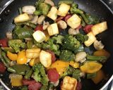 A picture of step 4 of Veg sizzler of sehezwan hakka noodles with sauteed vegetable.