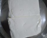 A picture of step 5 of Shahi paneer with white gravy.