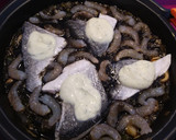 Foto del paso 5 de la receta: Arroz negro con dorada al horno