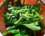A picture of step 3 of Bubur Manado / Tinutuan(in English & Indonesian language).