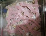Foto del paso 3 de la receta: Merluza con quesos y verdeo al horno
