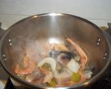 Foto del paso 6 de la receta: Arroz caldoso de calamares y alcachofas