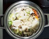 A picture of step 2 of Hearty Vegetable Soup with Napa Cabbage and Dumplings.