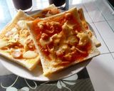 Foto langkah ke 6 dari resep Pizza roti ala Octa.