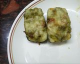 A picture of step 6 of Zucchini stuffed with cheesy Guacamole.