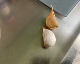 Une image de l'étape 6 de Poulet aux cacahuètes, carottes, tomates et épices.