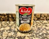 Foto del paso 1 de la receta Pastel con coca de almendras, cabello de ángel y ganaché
