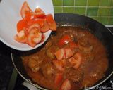 A picture of step 9 of Persian lamb kidneys with tomato sauce.