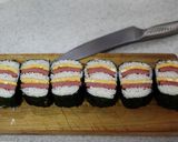 A picture of step 17 of Rolled Pork and Egg Onigiri.