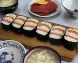 A picture of step 18 of Rolled Pork and Egg Onigiri.