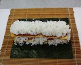 A picture of step 10 of Rolled Pork and Egg Onigiri.