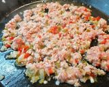 Foto del paso 2 de la receta: Paella de carne picada en costra de ajo
