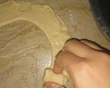 A picture of step 4 of Lacha Dar Paratha in layers of three kind.
