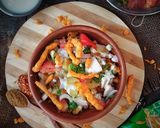 A picture of step 9 of Kurkure Bondhi Chaat.