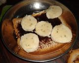 A picture of step 3 of PBC peanut,banana, chocolate SANDWICH.