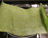 A picture of step 9 of Paneer wrapped in banana leaf.