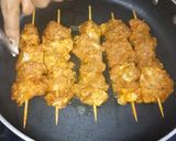 A picture of step 2 of Spicy Honey-Yogurt Mutton Kababs with sautéed veggies.
