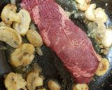 A picture of step 2 of My Garlic Butter Sirloin Steak with mushrooms & thick cut Chips.