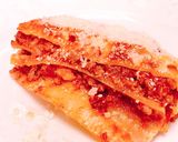 Hình bước làm 4 của món Mì Ống Cannelloni Nhồi Sốt Bò Bằm Bolognese Phủ Phô Mai Đút Lò