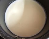 A picture of step 1 of Galangal masala tea.