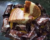 A picture of step 8 of Zebra Chocolate Vanilla Marble Cake.