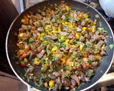 A picture of step 5 of Beef fry with fried rice.