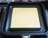 A picture of step 5 of Large Japanese-Style Pancake with a Sandwich Maker.