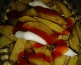 A picture of step 4 of Masala fries.