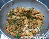 A picture of step 2 of Gobhi Tawa Pulao.