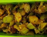 A picture of step 9 of Roti with brinjal aloo fry.
