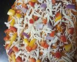A picture of step 3 of Herbed pizza roll ups.