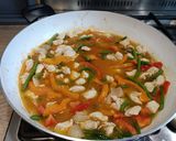 A picture of step 7 of Hairy Bikers All-In-One Spicy Pork and Rice.