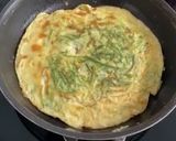 A picture of step 2 of Cha-om Omelet.