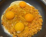 A picture of step 3 of Eggs Fried in Parmesan Breadcrumbs with Wilted Spinach.