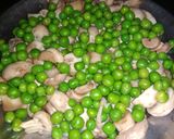 A picture of step 6 of Mushroom Matar Paneer Masala.