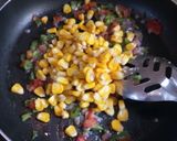 A picture of step 2 of Corn cheese open sandwich.