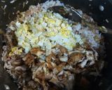 A picture of step 2 of Chicken egg fried rice.