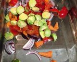 A picture of step 2 of Chop & chuck chicken & chorizo traybake.