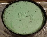 A picture of step 18 of Mint Chococolate Chip Cheesecake with a Fudge Brownie Crust.