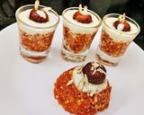 A picture of step 4 of Gazar Ka halwa with Rabadi and gulab jamun.